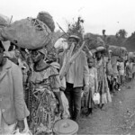 Im Krisengebiet während der Massenflucht der ruandischen Bevölkerung nach Zaire.
Flüchtlinge am Grenzübergang Ruzuzi I in Cyangugu, Ruanda am 21.08.1994